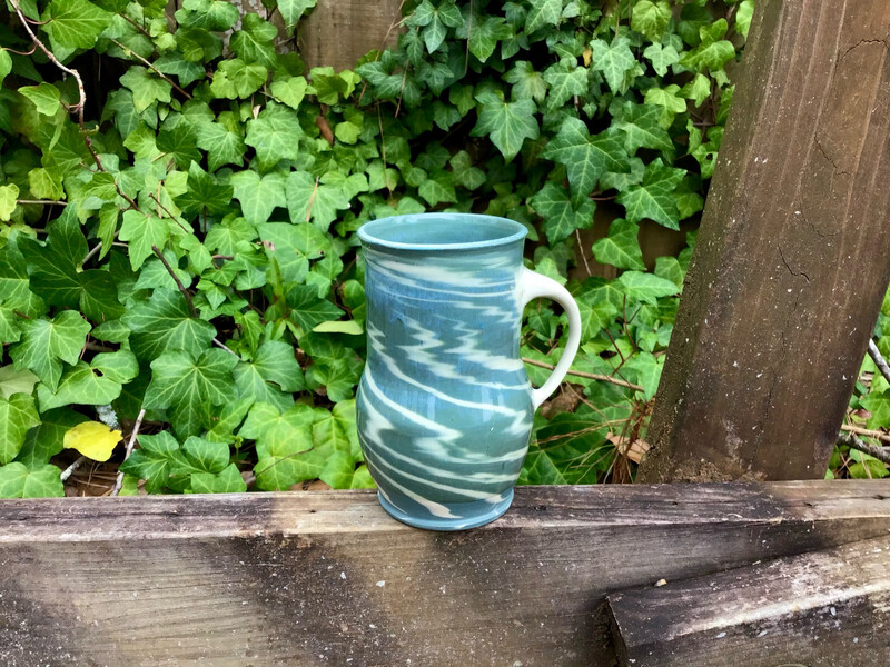 large sea-foam green tiger striped mug