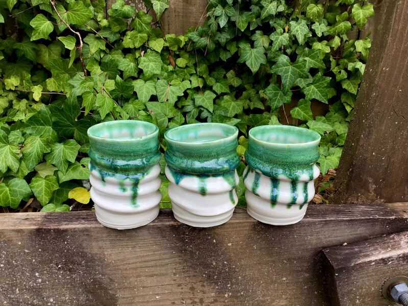 white green swirled cups