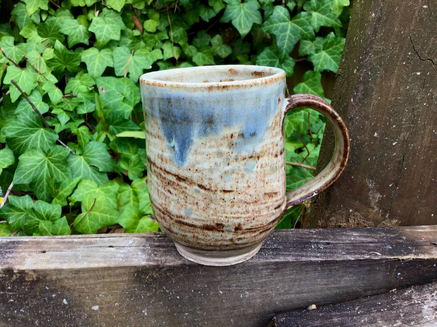 tan light blue/gray mug