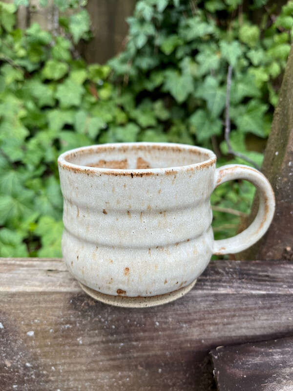 small white tan mug