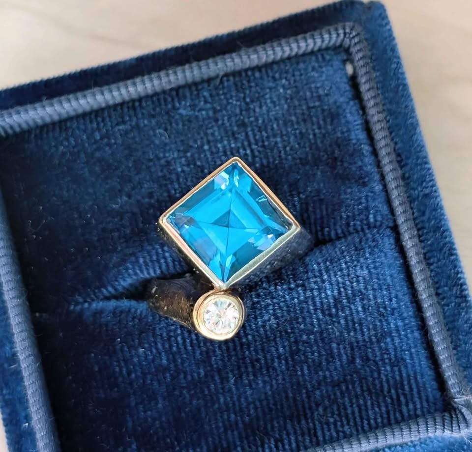 Blue Topaz and Natural Diamond Two-Tone White and Yellow Gold Bezel Set 14k Ring