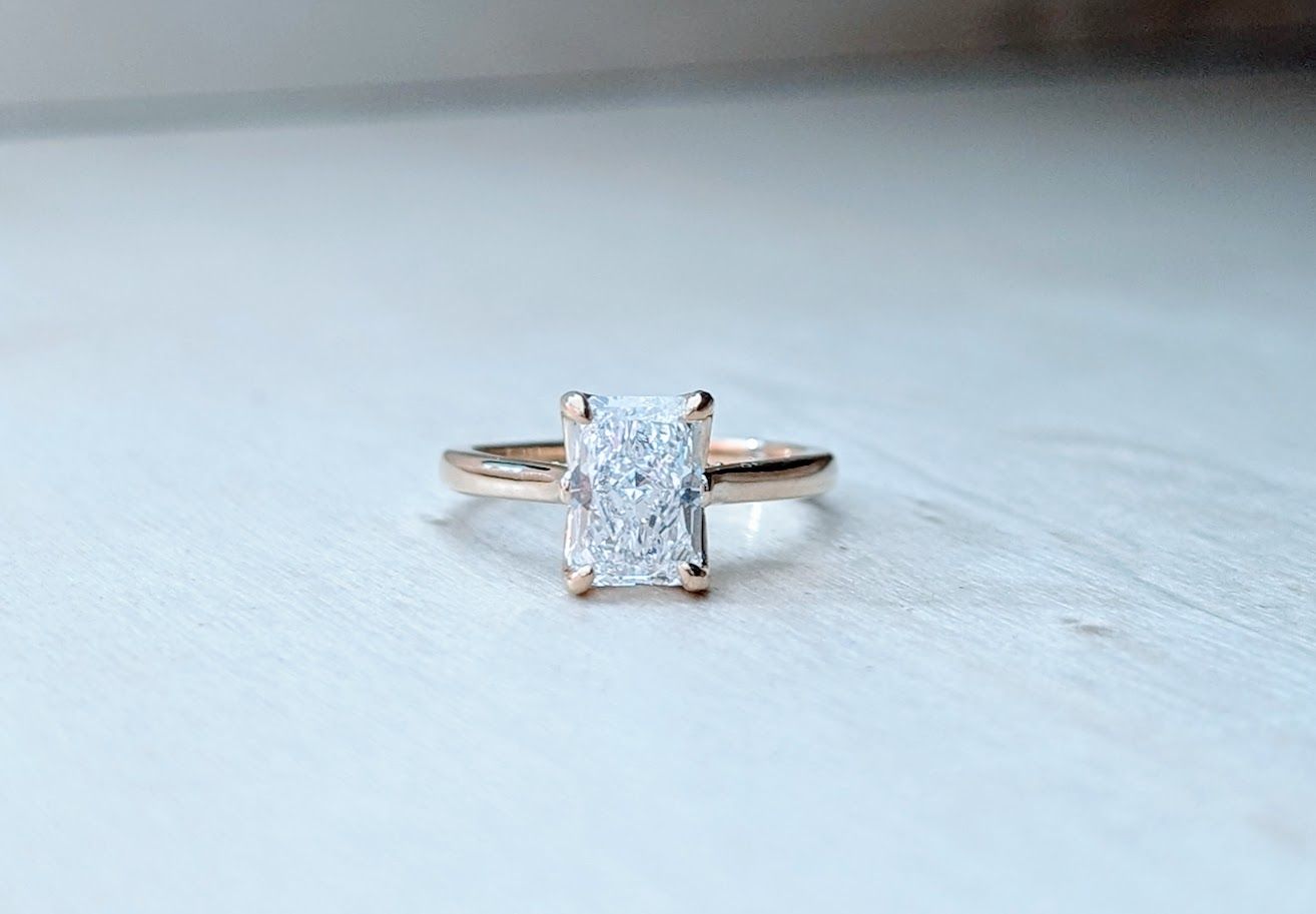 1.90 Ct Lab Grown Radiant Solitaire Set in Yellow Gold With Profile Diamond Accents