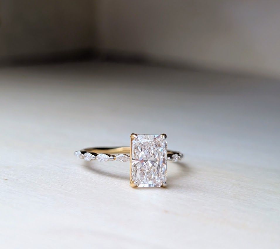 Stunning 2 Carat Radiant Cut in Delicate Marquise Accented Band in Yellow Gold