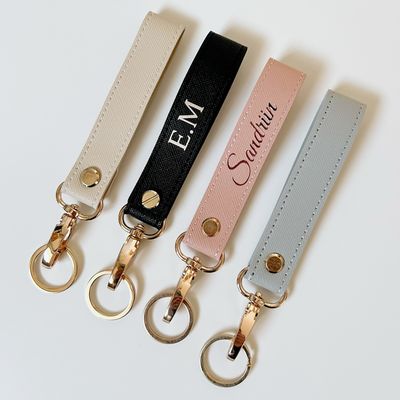 Personalized Faux Leather Keychain Personalized faux leather keychains in four colors - black, beige, pink and grey