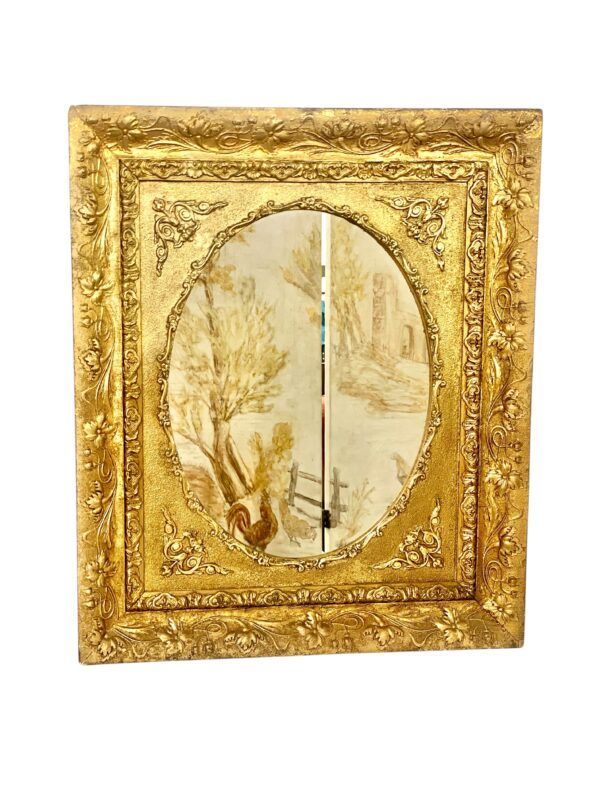 Miroir mural médaillon avec cadre floral doré