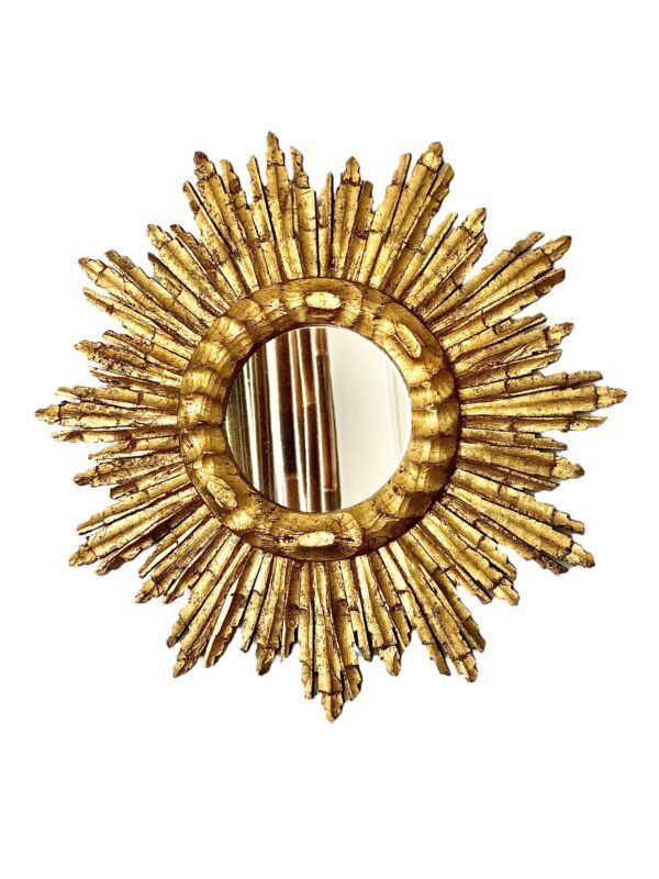 Miroir vintage en bois doré à motif soleil