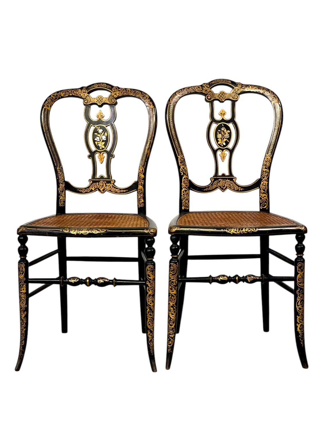 Paire de fauteuils d'opéra en bois noirci et assises en rotin, époque Napoléon III