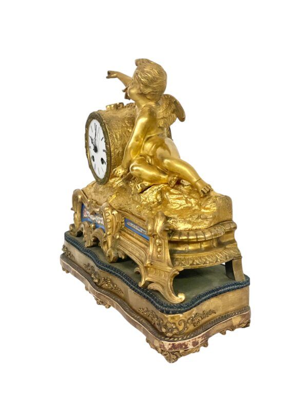 Pendule en bronze doré et porcelaine du XIXe siècle par « Miroy Frères »