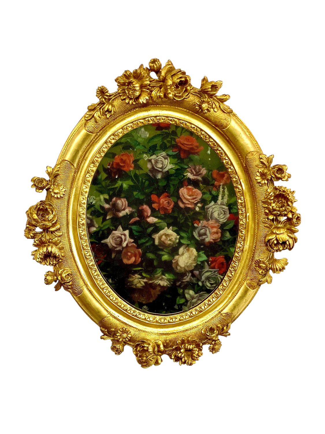 Miroir ovale ancien en bois doré de style Louis XVI avec décor de fleurs sculptées
