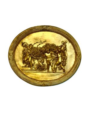 Bas-relief ovale en plâtre doré du XIXe siècle avec putti et guirlandes
