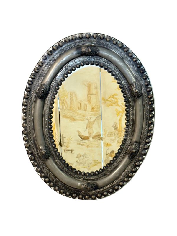 Antique miroir ovale en métal gaufré avec cabochons et rosaces