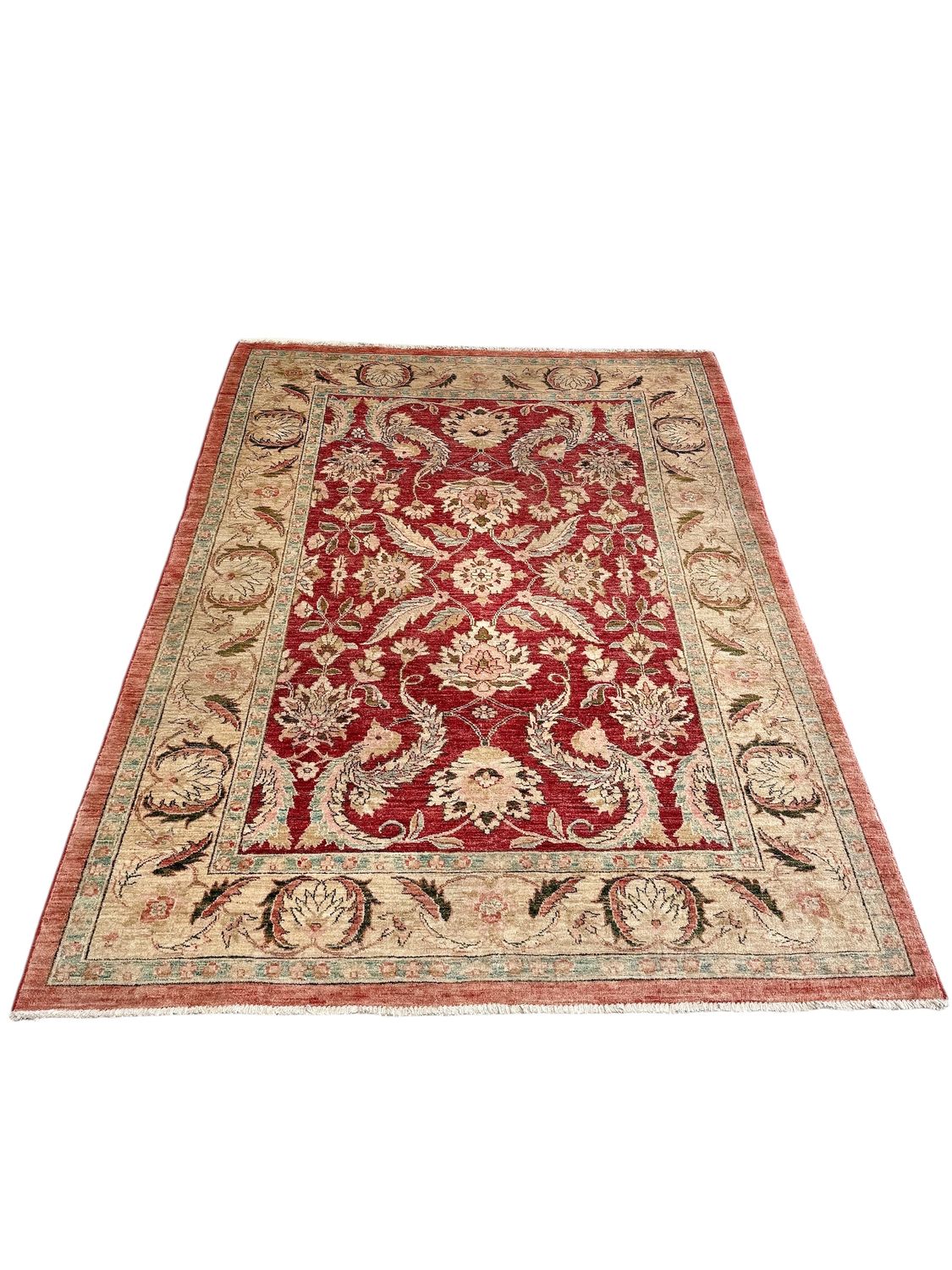 Tapis persan en laine noué à la main avec fond rouge et bordure florale