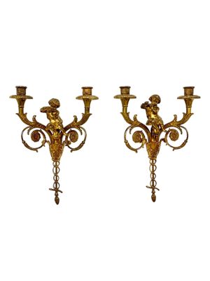 Attribué à la Maison Charles Paire d'appliques murales hautes en bronze doré