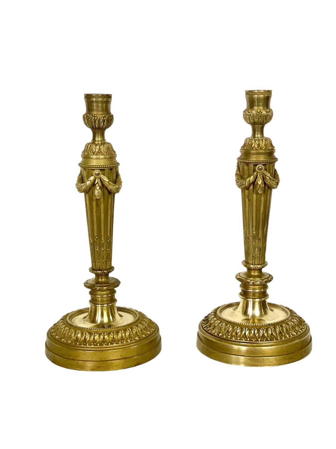 Pair of Neoclassical Gilt Bronze Candlesticks