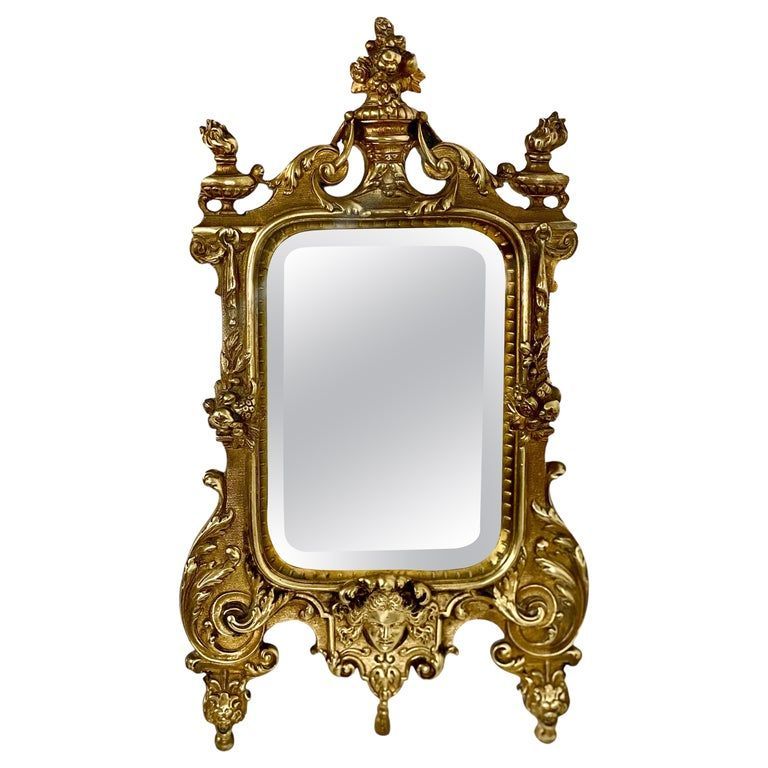 Miroir de courtoisie rococo en bronze doré