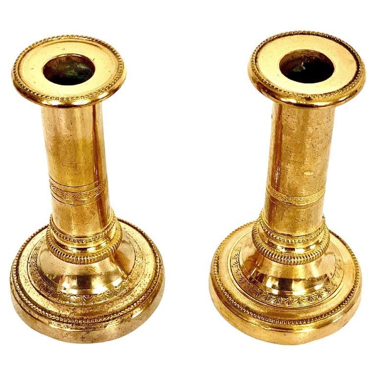 Petite Pair of Gilt Bronze Candlesticks. 19th Century