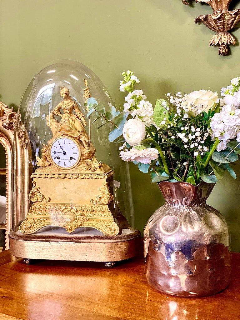 Horloge française ancienne en bronze doré ciselé