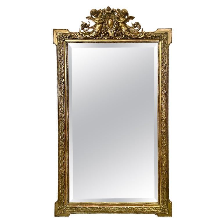French Napoleon III Giltwood Mirror with Cherubs and Coat of Arms, circa 1870