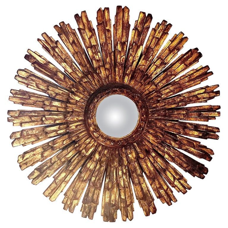 Impressionnant miroir convexe doré à la feuille d'or