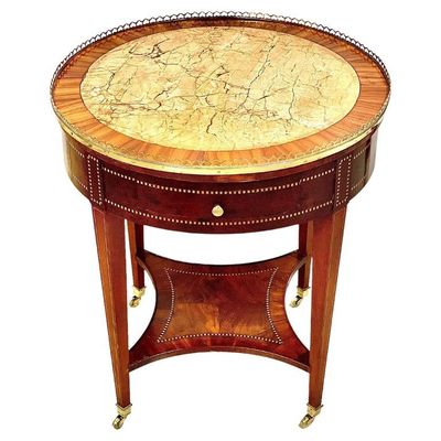 Table guéridon incrustée de marqueterie du XIXe siècle