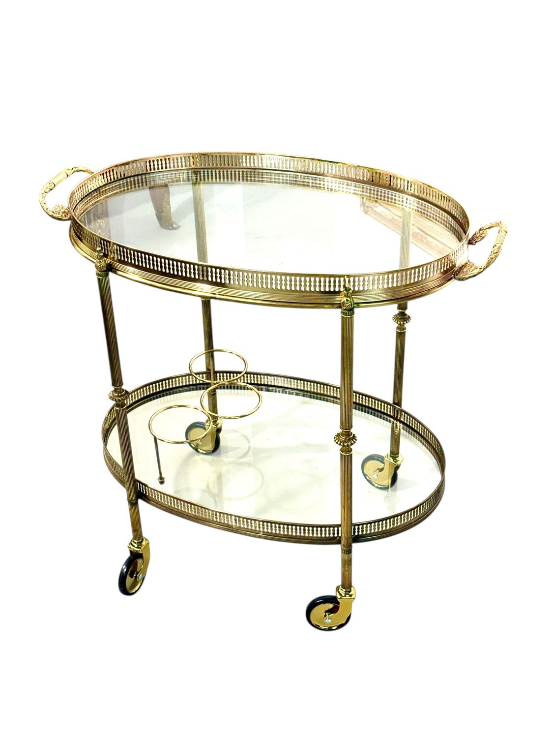 Petite desserte roulante de bar ovale en laiton doré, France vers 1950