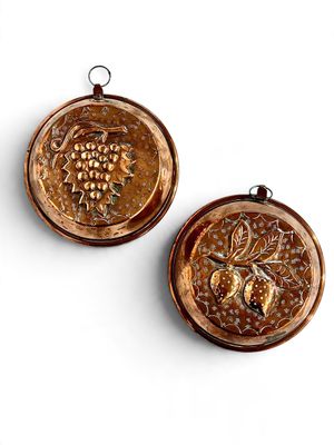 Pair of Antique French Repoussé Copper Moulds with Fruit Motifs