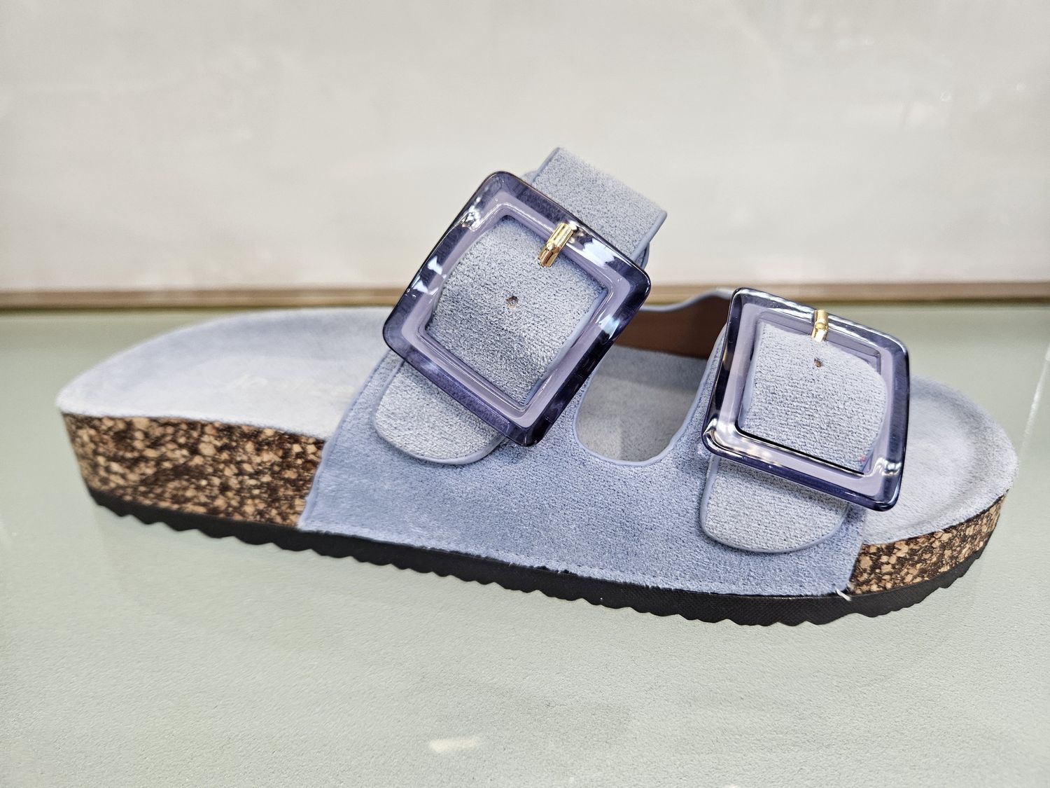 Blauwe slipper met gesp