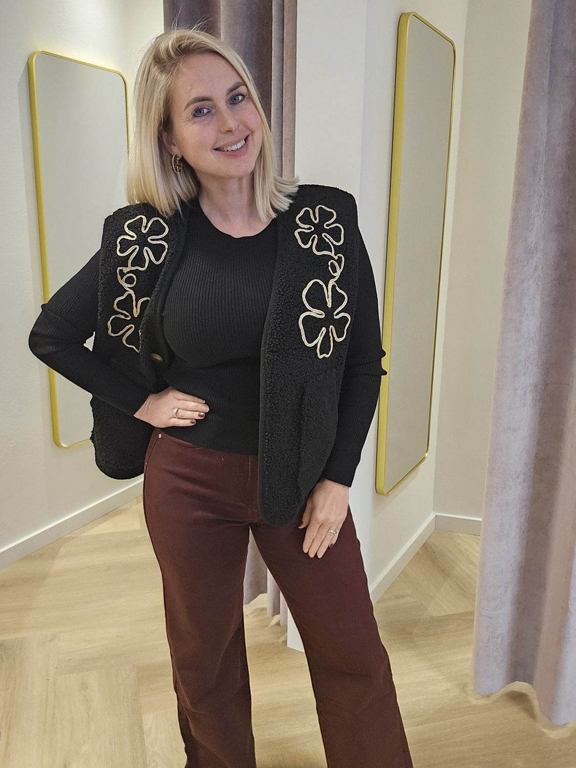 Gilets met krulletjes en bloemen