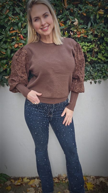 Flared jeans met steentjes