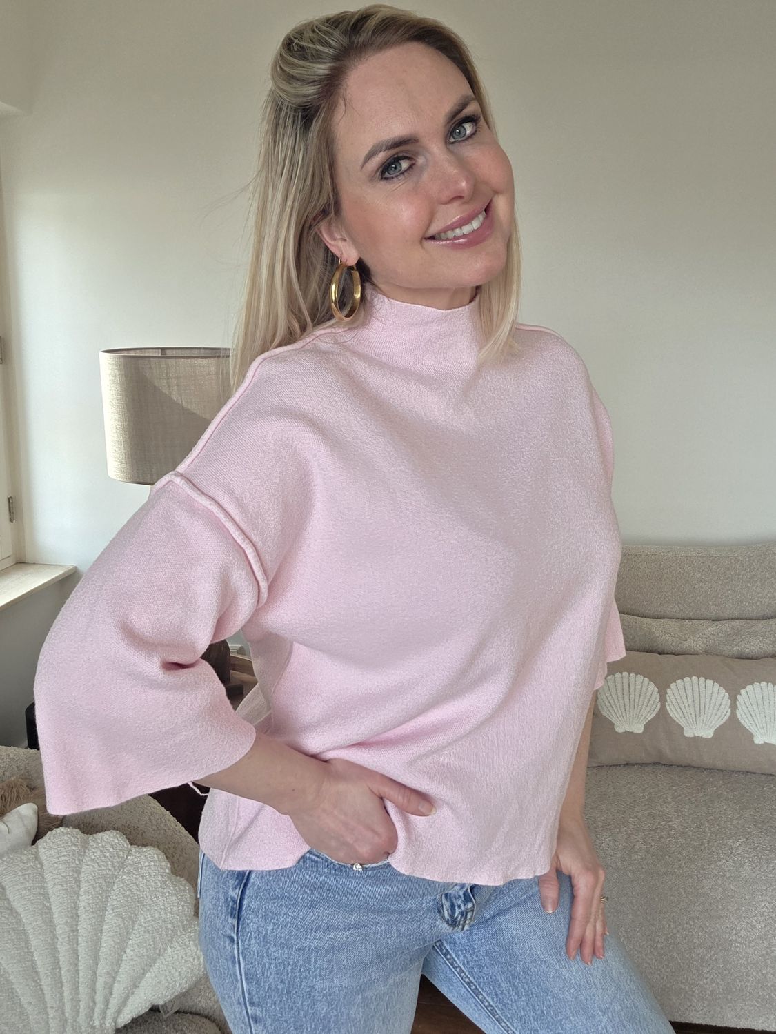 Roze trui met naad