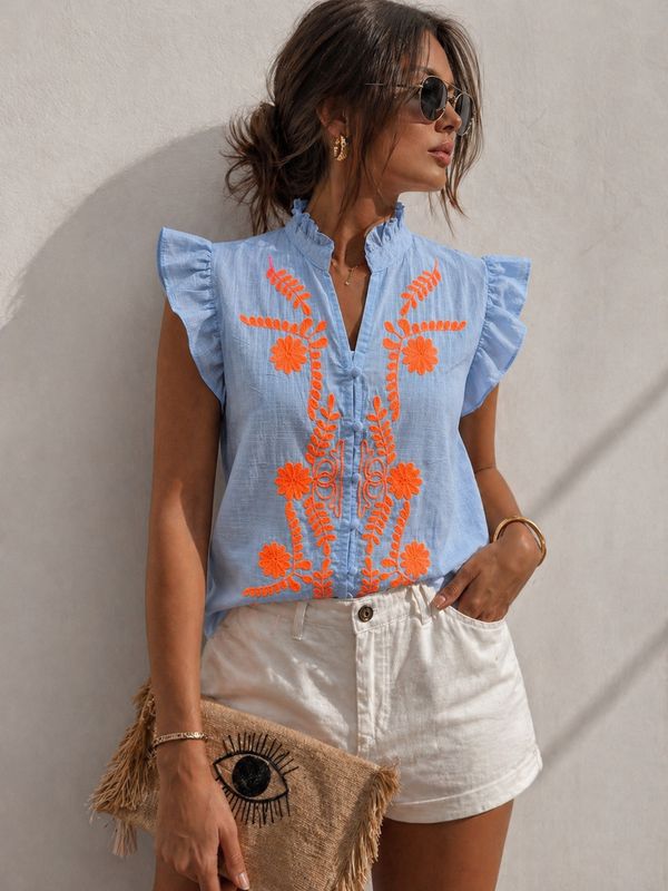 Blauw zomerblousje met oranje stiksels