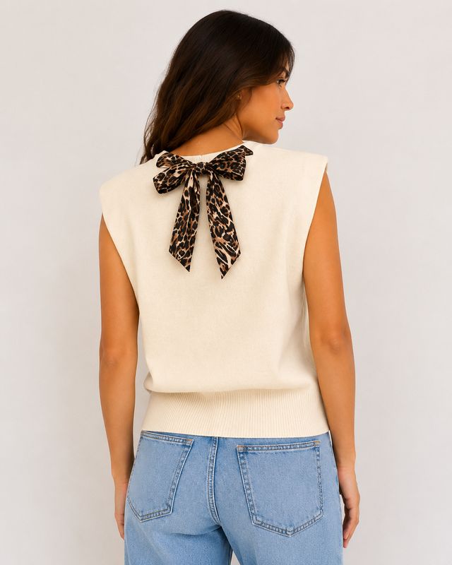 Beige gebreide top met luipaard strik