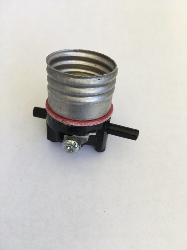 LEVITON BRAND MEDIUM BASE PUSH THRU SOCKET INTERIOR.
