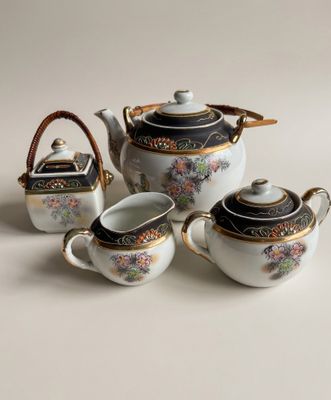 Vintage porseleinen theeservies vogeltjes bloemetjes goudrand