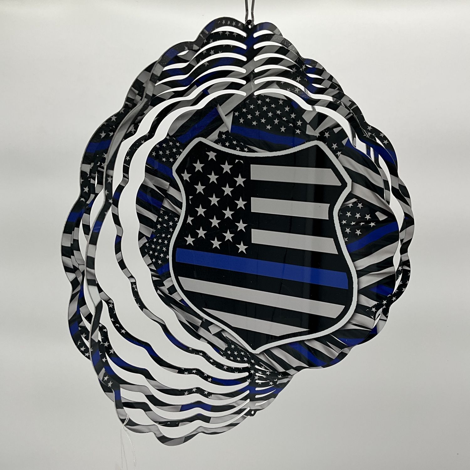 Back the blue flag spinner