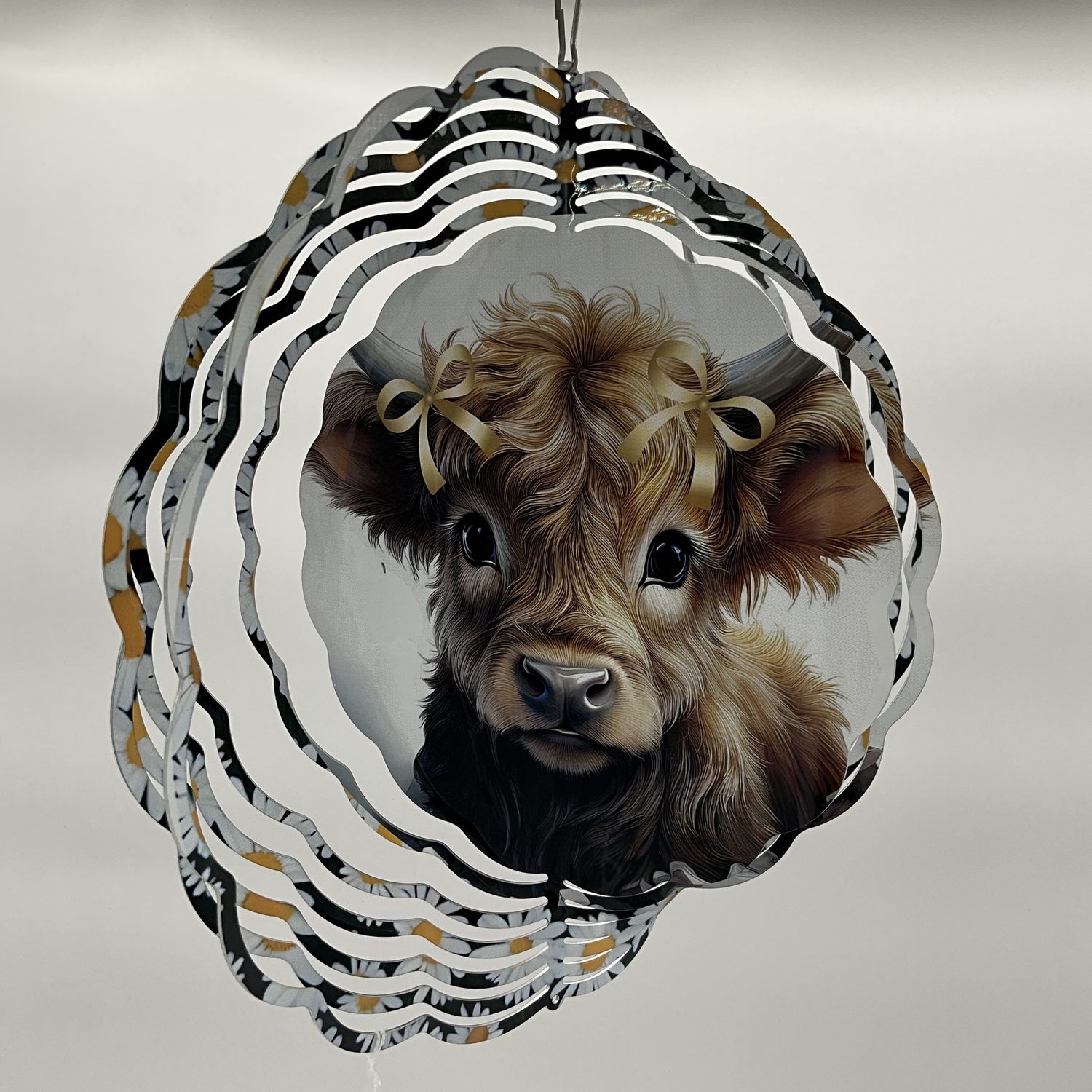 highlander cow front/back spinner