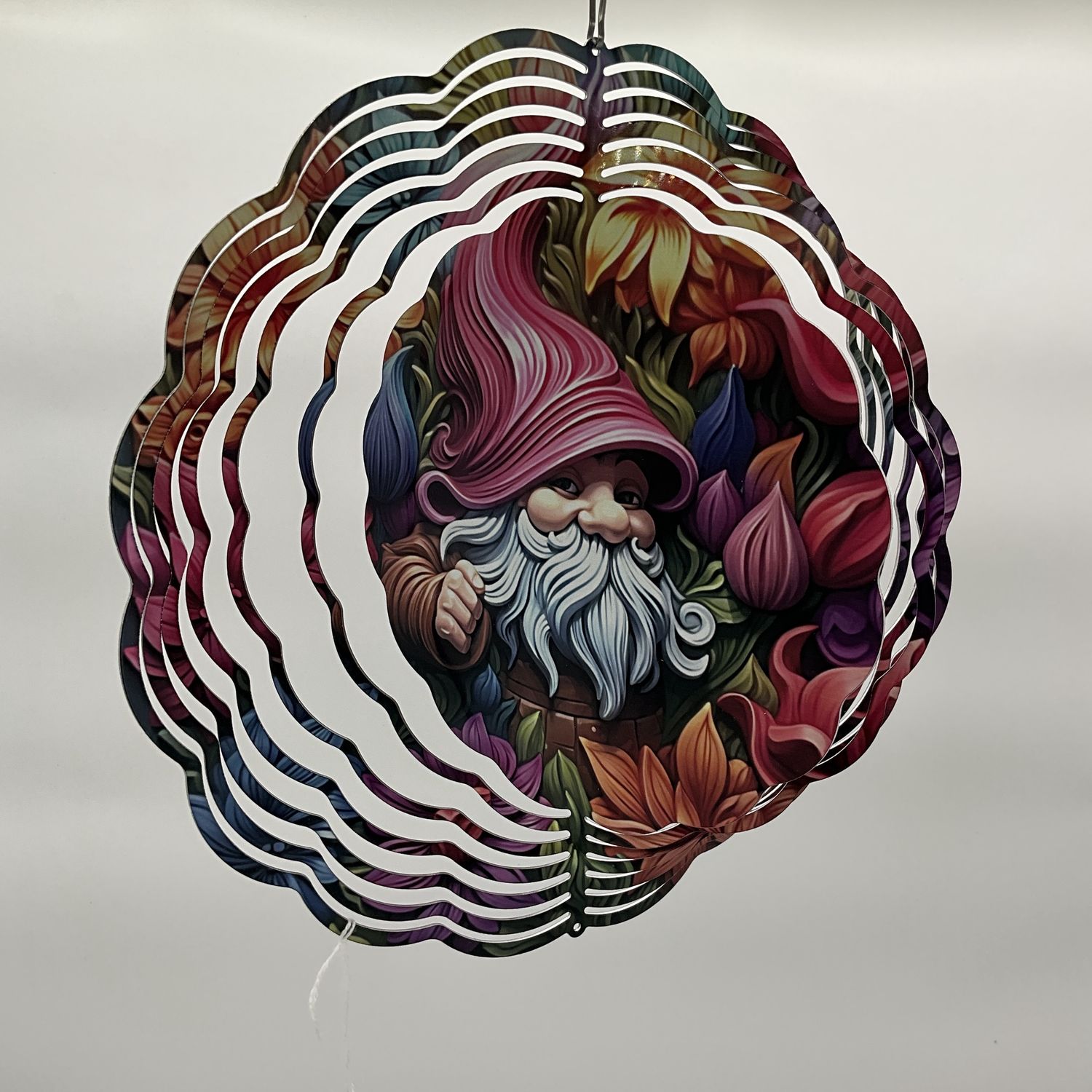 gnomes in the center of colorful flowers spinner