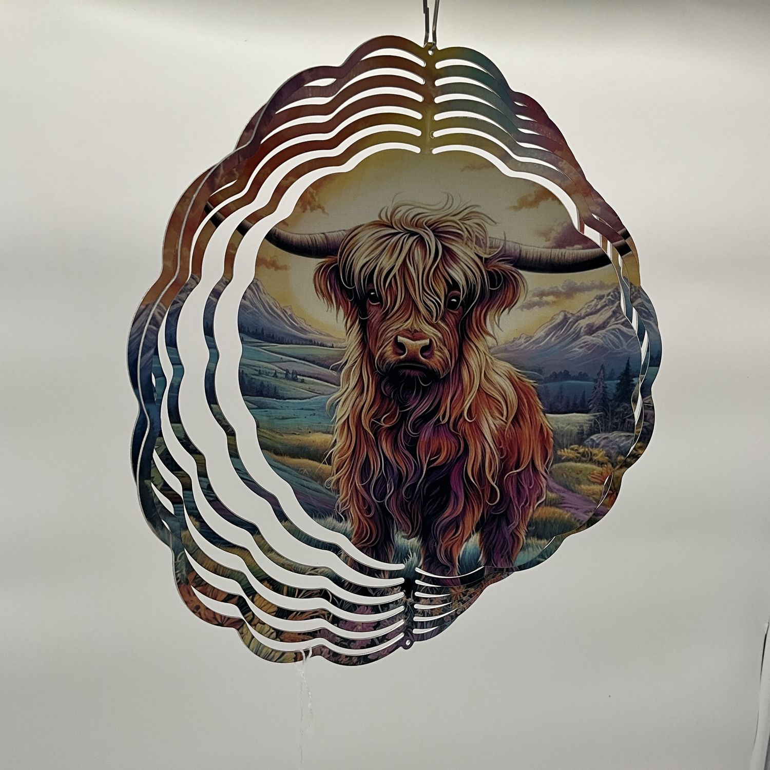 highlander cow spinner colorful background