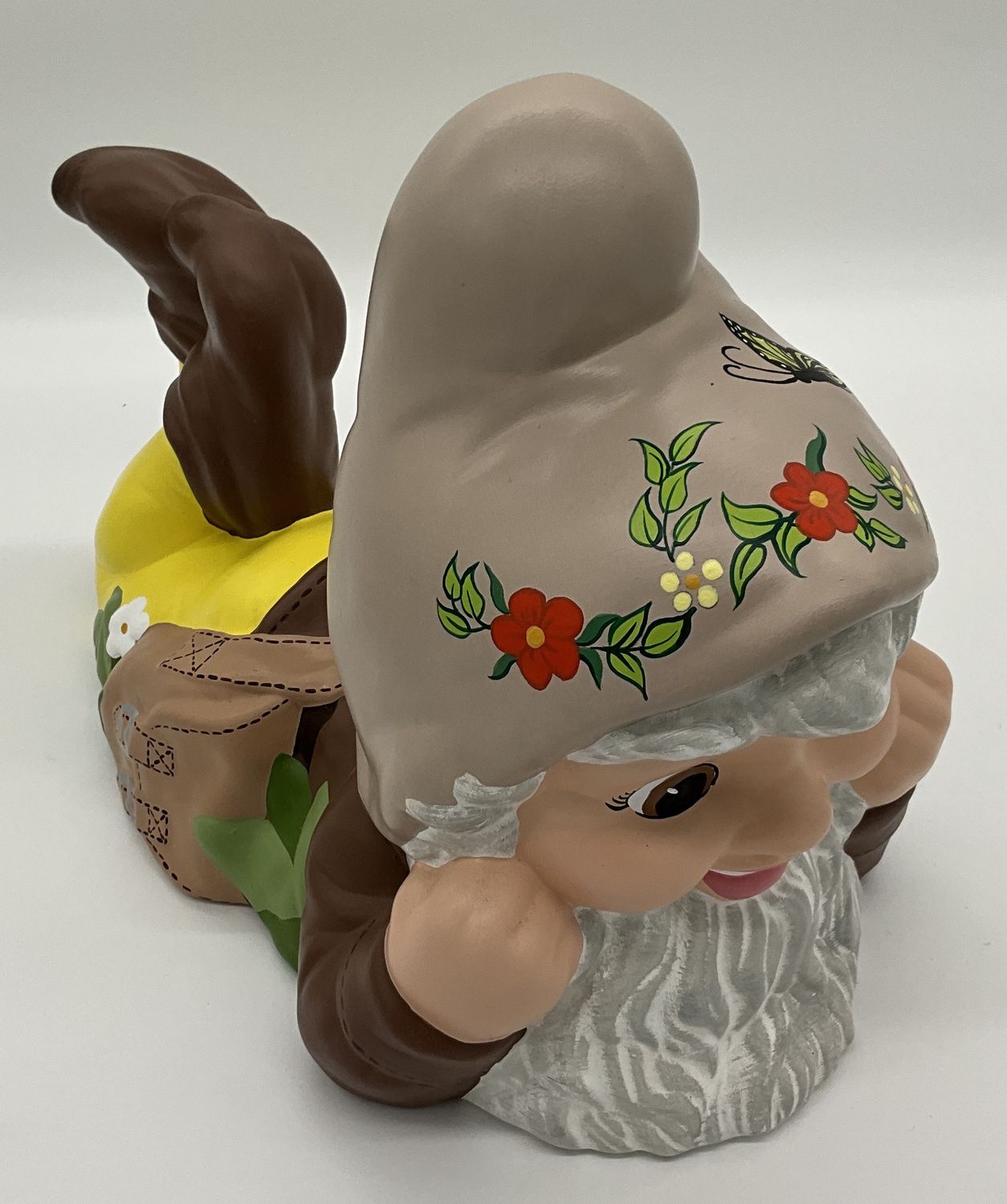 Ceramic gnome on tummy