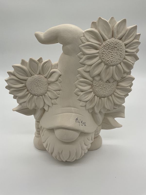 Ready to paint gnome with sunflowers