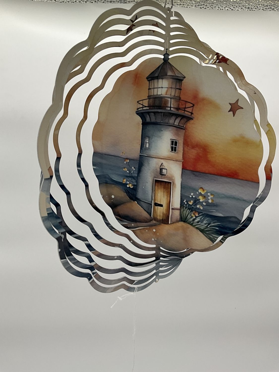 light house spinner in pastel