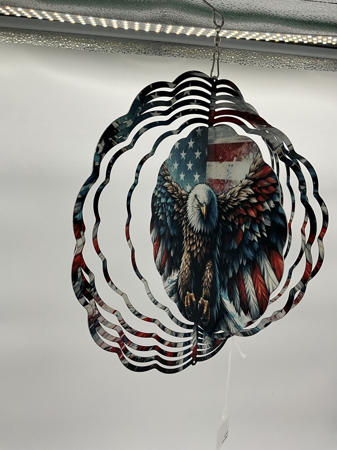 Eagle in front of flag wind spinner