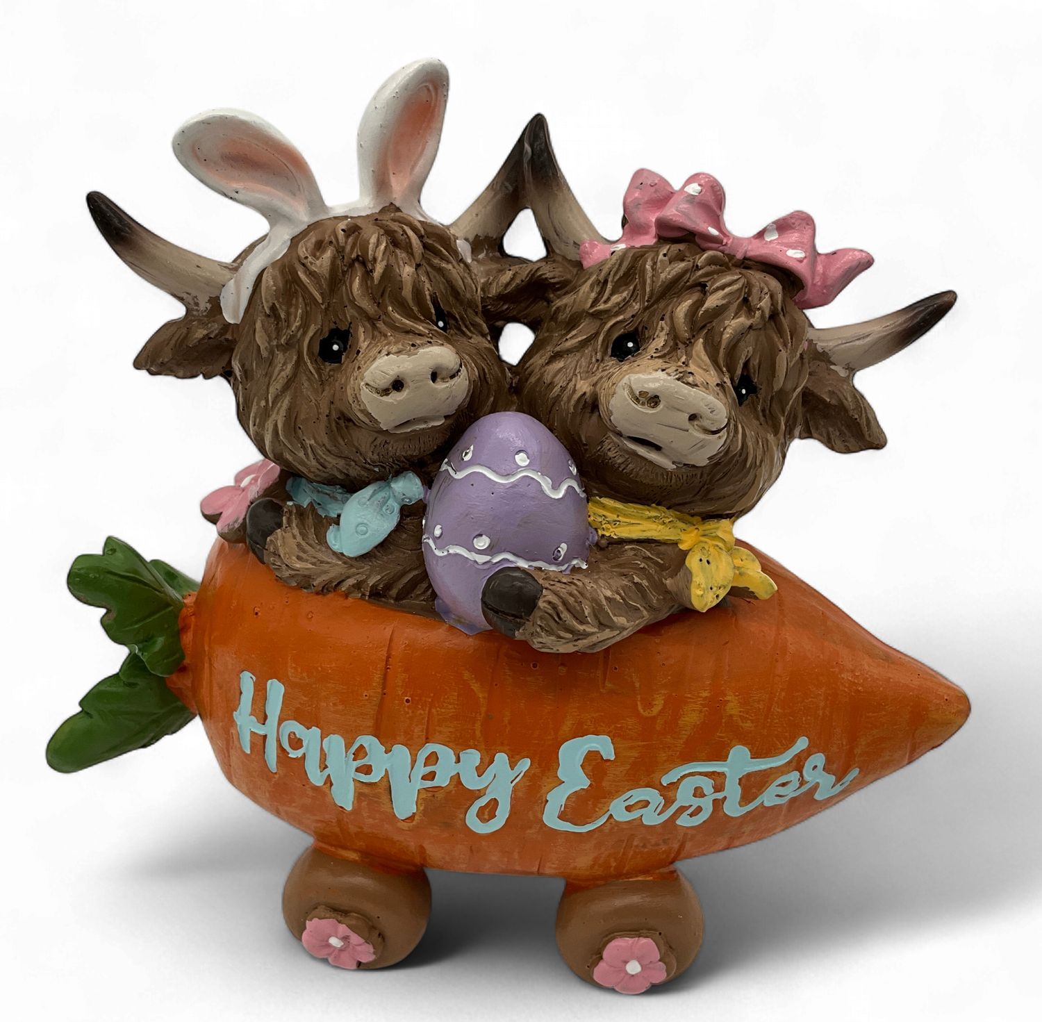 HIGHLAND COW IN CARROT CAR