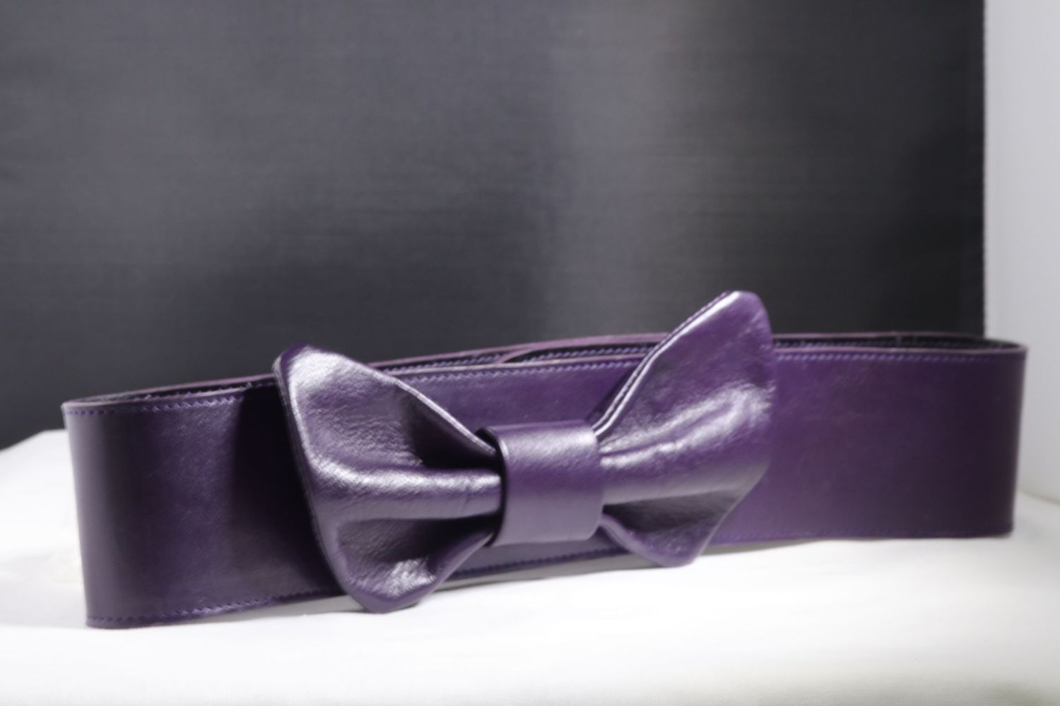 Hobbs purple belt with bow press studs closure Size S