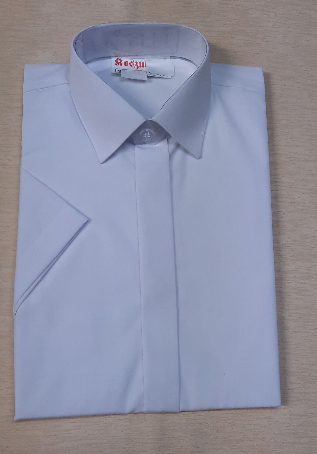 Biała koszula dla chłopca z krótkim rękawem