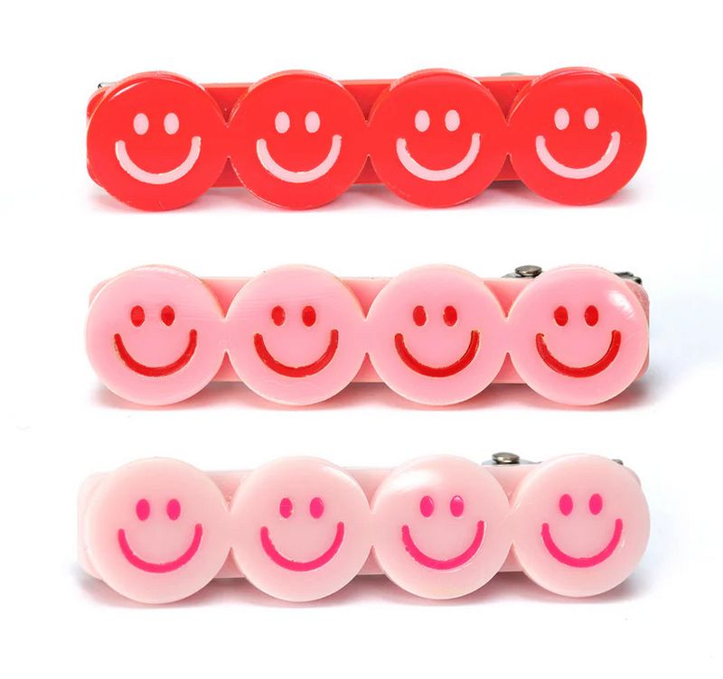 happy faces hairclips- reds &amp; pinks