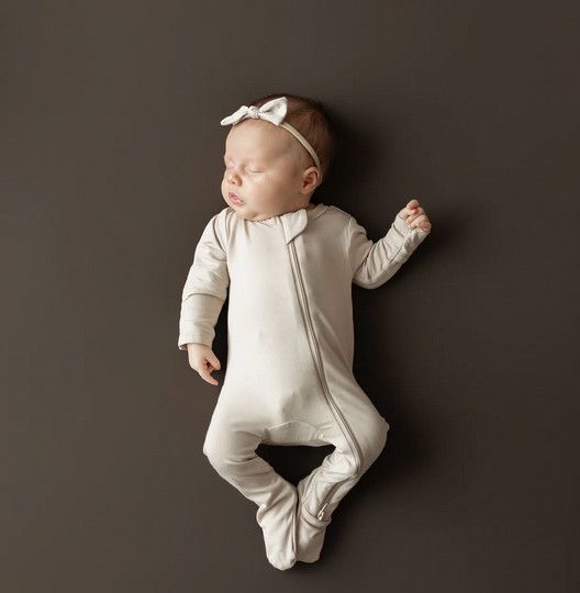zippered footie- bisque