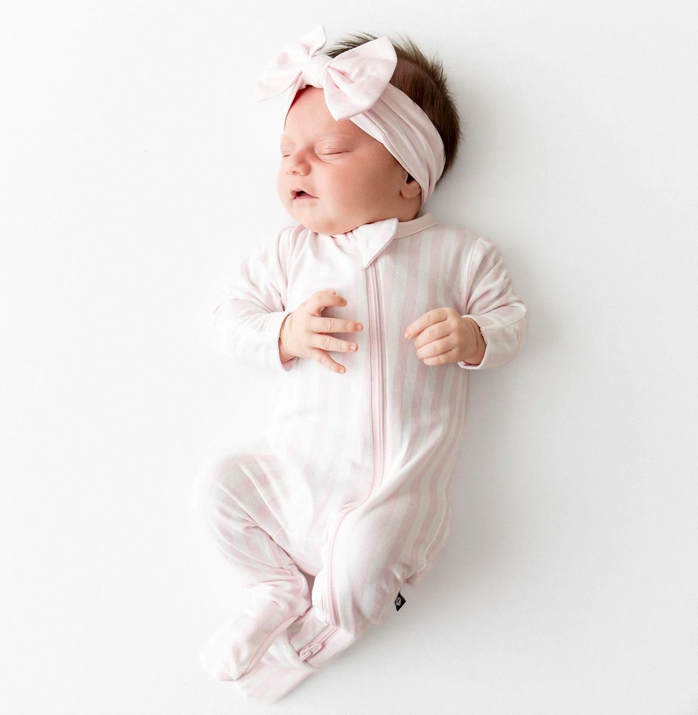 zippered footie- sakura stripe