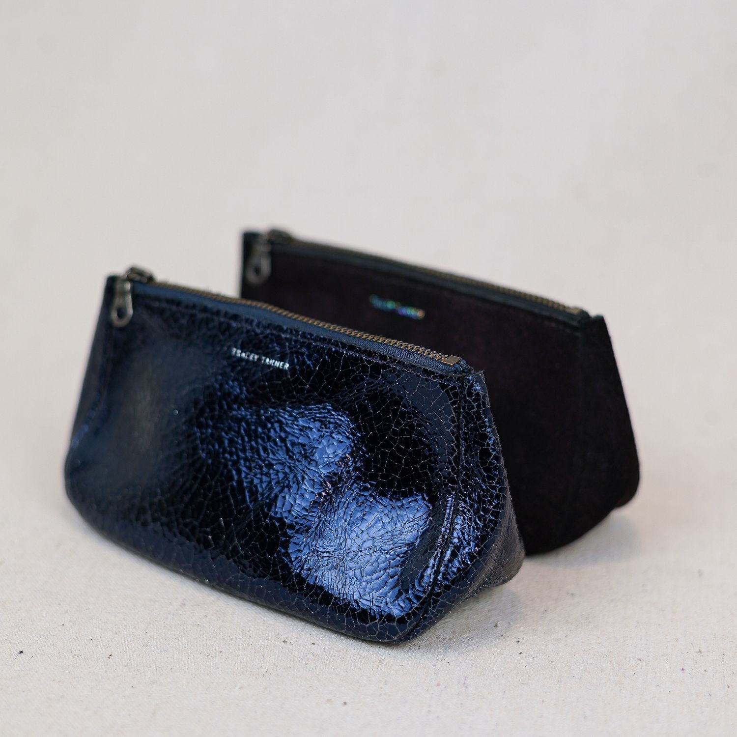 small roomy zip pouch shiny leather