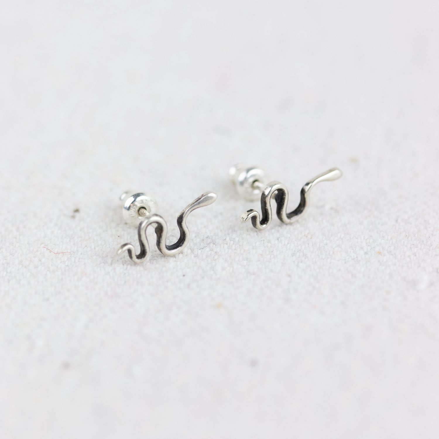 tiny snake studs
